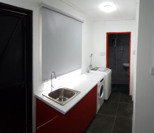 Subang 2 Landed House Laundry area with washer and dryer 